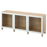 Credenza in legno chiaro e anta in vetro bianco, tre sezioni, design moderno.