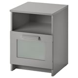 Tavolino BRIMNES grigio con ripiano superiore aperto, cassetto singolo e pannello frontale in vetro.