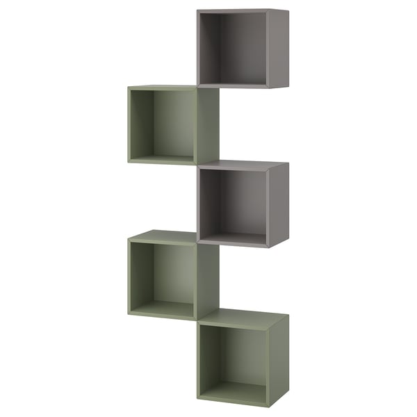 Mensola a muro modulare verde e grigia, design geometrico, cinque cubi interconnessi.