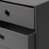 Mini cassettiera in tessuto grigio con struttura robusta, cuciture a vista e maniglie circolari metalliche.
