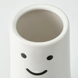 Vaso viso felice, bianco con occhi neri.