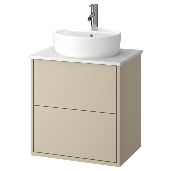 Mobile bagno sospeso HAVBÄCK beige con lavabo rotondo bianco e rubinetteria cromata.