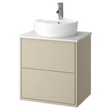 Mobile bagno sospeso HAVBÄCK beige con lavabo rotondo bianco e rubinetteria cromata.