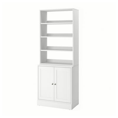 Libreria in legno HAVSTA bianco, ripiani a giorno e armadio chiuso.