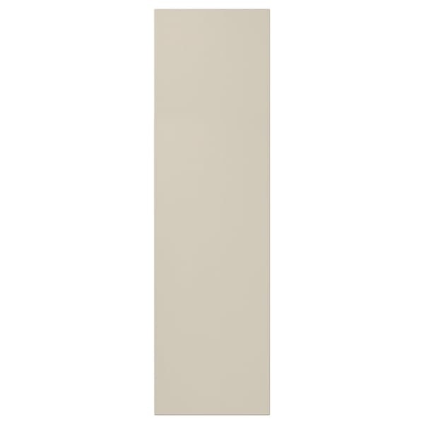 Un'anta beige HAVSTORP dal design liscio e moderno realizzata in vernice acrilica e fibra di legno.