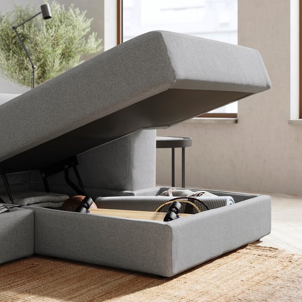 Divano modulare moderno grigio JÄTTEBO con sedile sollevabile, pavimento in legno.