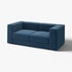 Divano a forma di L in velluto a coste blu turche, moderno e confortevole.