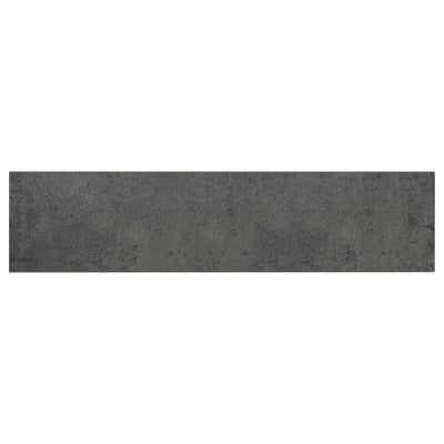 Un pannello da cucina in kalhytten grigio scuro con un effetto cemento e una texture sottile, forma rettangolare e superficie liscia.