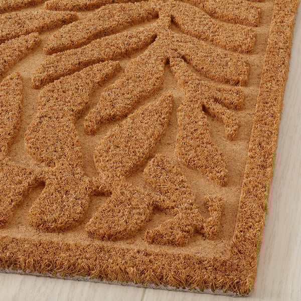 Zerbino con motivo a foglie in rilievo, fibre di cocco, superficie strutturata 3d.