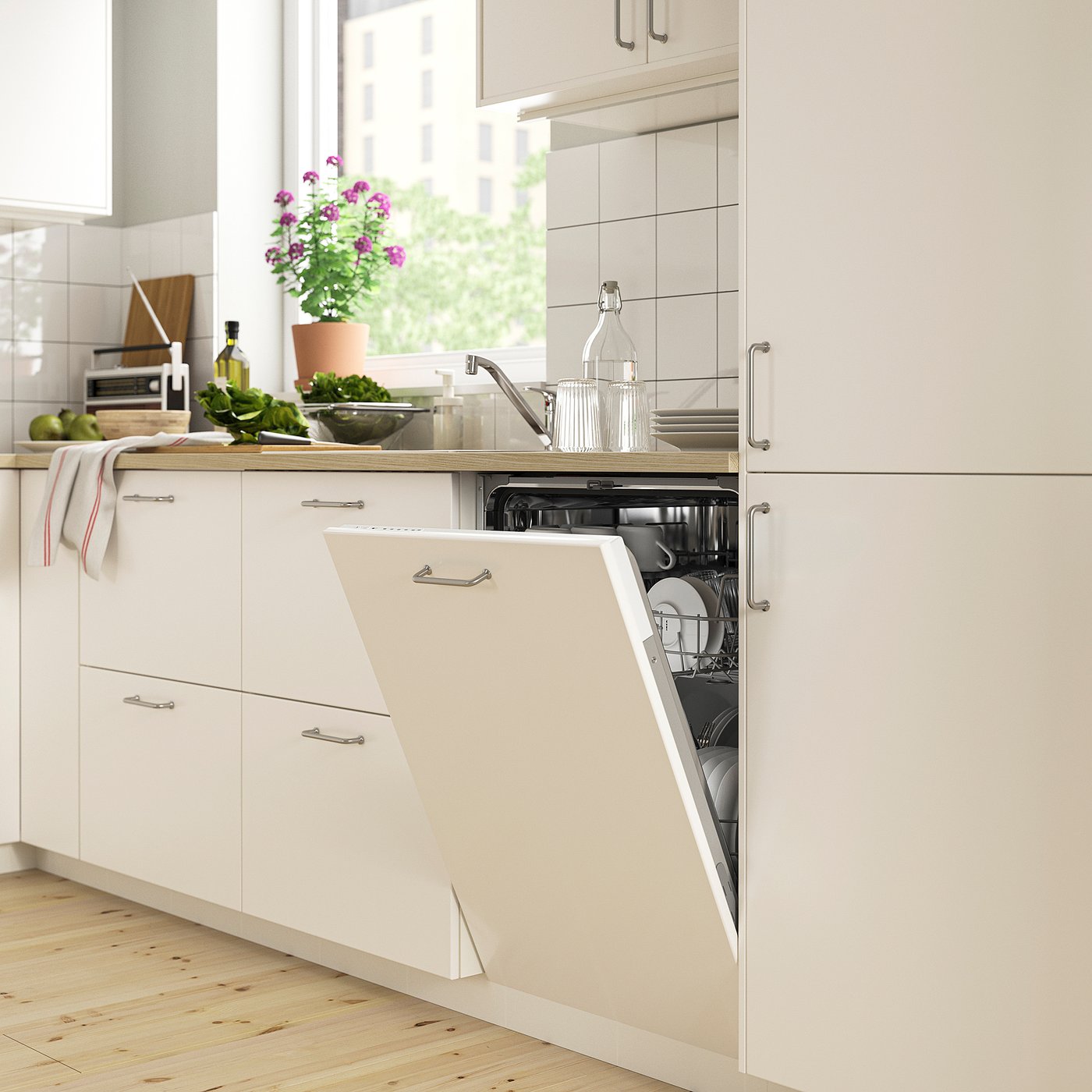 Cucina moderna con lavastoviglie LAGAN e prodotti freschi.