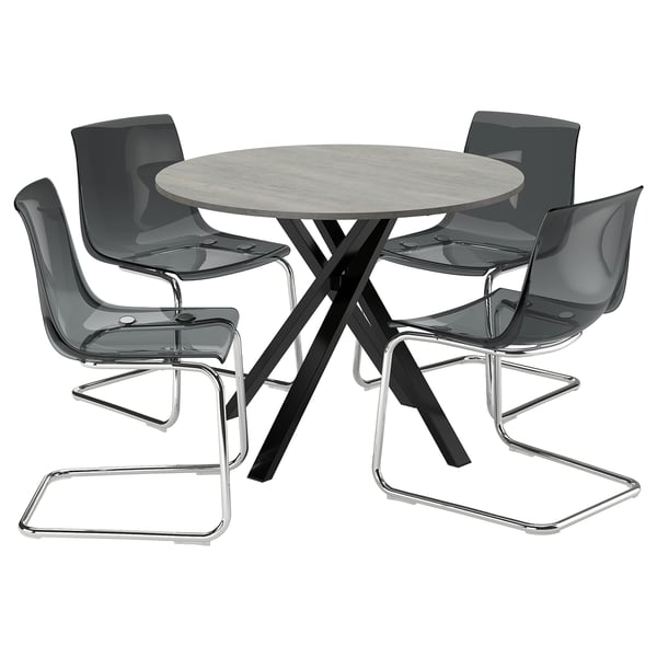Moderno set da pranzo rotondo con sedie grigie, elegante base del tavolo in metallo e design elegante.