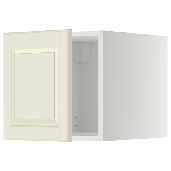 Mobile da cucina METOD bianco sporco, anta aperta che rivela l'interno vuoto.