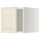 Mobile da cucina METOD bianco sporco, anta aperta che rivela l'interno vuoto.