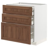 Un mobile da cucina METOD bianco con cassetti in noce dal design moderno.