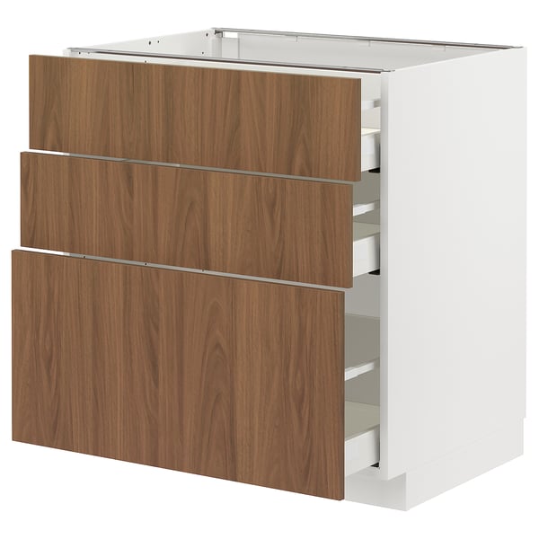 Cucina moderna: METOD. Cassetti bianchi e noce, eleganti e lisci. Tre ampi cassetti.