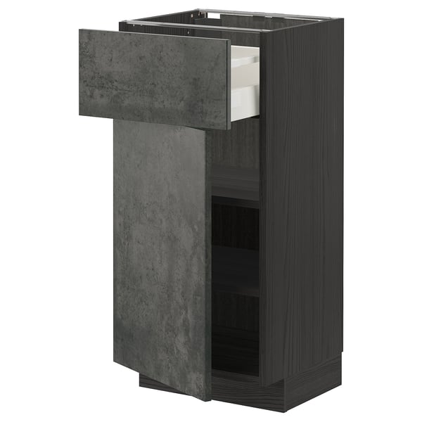 Un mobile da cucina moderno grigio scuro della serie METOD, con finitura effetto cemento e cassetto singolo a giorno.