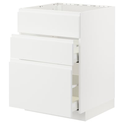 Un mobile da cucina METOD bianco con maniglie integrate e tre cassetti.