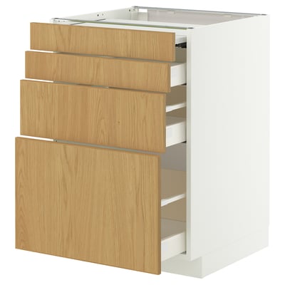 Un mobile METOD bianco con tre cassetti in rovere chiaro. Il design è moderno e minimalista.