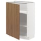 Un mobile da cucina METOD bianco con un'unica anta in legno che si apre, rivelando un ripiano regolabile all'interno.