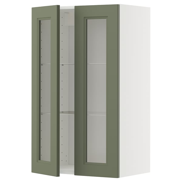 Un mobile da cucina METOD verde con ante in vetro e cornice bianca, dal design moderno e ripiani regolabili.