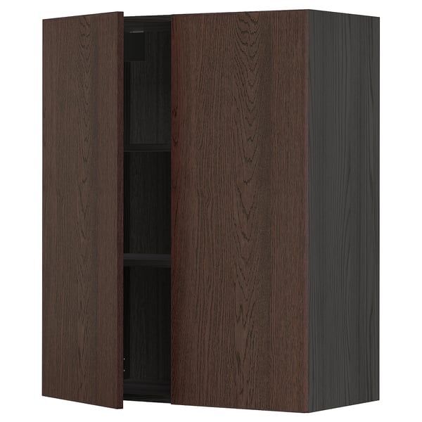 Mobile da cucina in legno marrone scuro con due ante leggermente socchiuse, che rivela un ripiano regolabile all'interno.