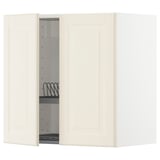 Mobile da cucina bianco sporco con anta aperta che mostra la griglia nera all'interno, parte del sistema IKEA METOD, forma rettangolare dal design semplice.