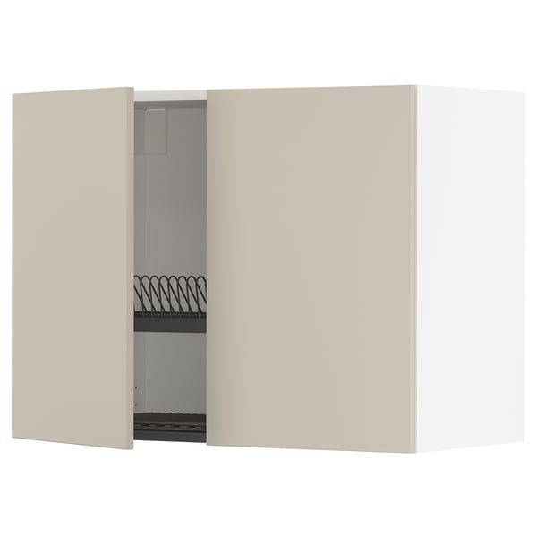 Un mobile da cucina METOD beige aperto con scolapiatti in filo metallico.