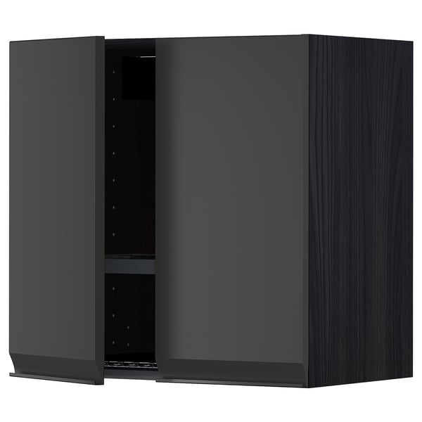 Moderno mobile da cucina nero con design elegante e ripiano regolabile.