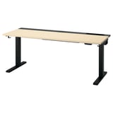 Scrivania sit-stand MITTZON: piano in legno chiaro, gambe nere, doppio motore per la regolazione dell'altezza. Ideale per il comfort ergonomico a casa o in ufficio.