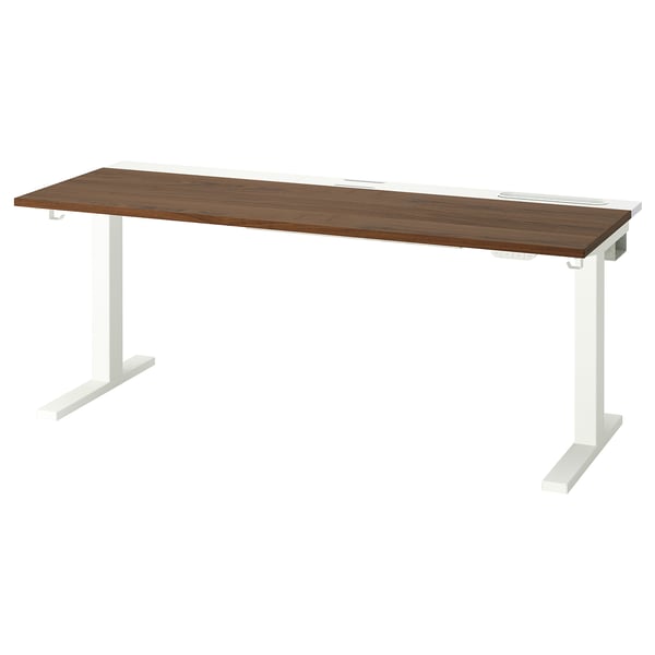 Scrivania sit/stand MITTZON, piano marrone, gambe bianche, altezza regolabile, design ergonomico.