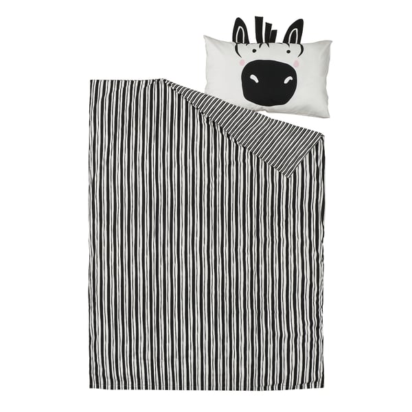 Biancheria da letto a tema zebra: piumino a righe bianche e nere con cuscino zebrato da cartone animato.