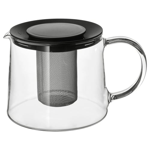 Teiera RIKLIG in vetro trasparente con coperchio nero e inserto in rete per foglie di tè, manico sul lato destro.