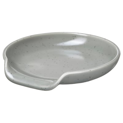 Un poggiacucchiaio RÖDSYRA di colore bianco con motivo a pois. Realizzato in gres, ha una forma liscia e curva per una facile conservazione degli utensili.