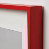 Cornice rossa con bordi lisci e robusti, progettata per visualizzare le foto in modo sicuro.