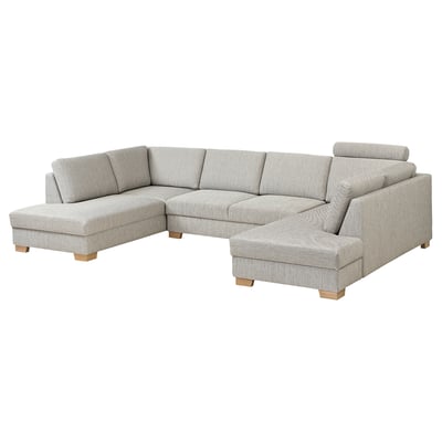 Divano angolare moderno in tessuto grigio con gambe in legno chiaro, forma a U, design minimalista.