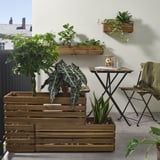 STJÄRNANIS fioriere in legno di acacia. Multilivello, robusto, espone piante di grandi dimensioni. Si piega in piano per riporlo.