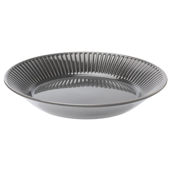 Ciotola in ceramica grigia con design a coste, forma rotonda. Fa parte della collezione STRIMMIG.