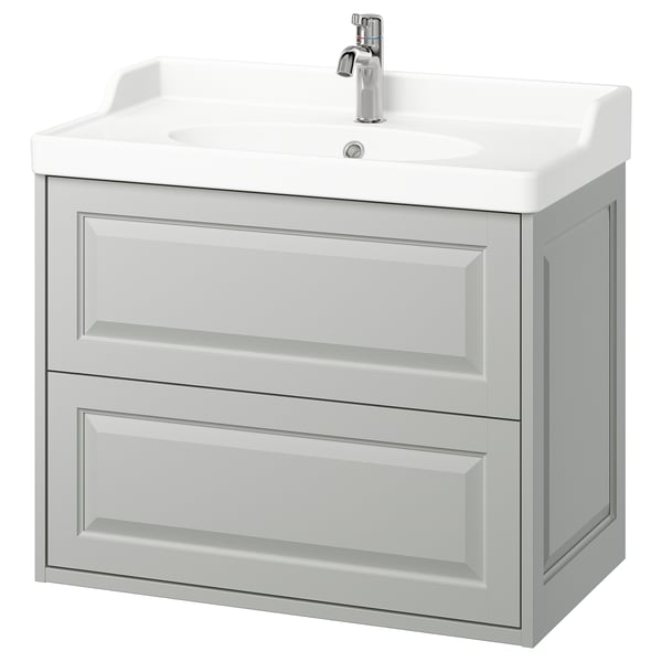 Mobile da bagno TÄNNFORSEN grigio chiaro, sospeso con 2 cassetti, bordi smussati, piano lavabo in ceramica e rubinetto cromato.