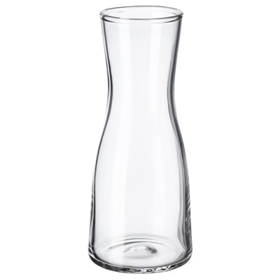Vaso in vetro trasparente dal design curvo. Forma semplice, elegante e adatta per piccoli allestimenti floreali.