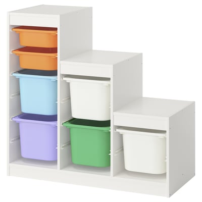 Contenitori di plastica colorati su organizer bianco.