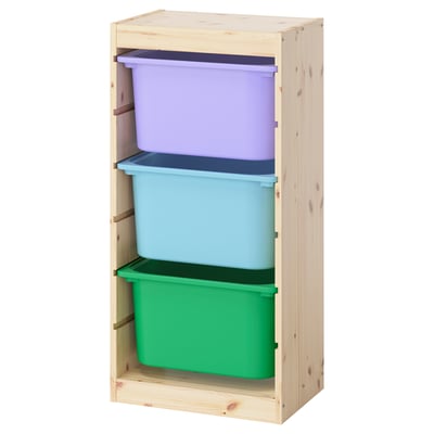 Mobile contenitore TROFAST con contenitori in plastica colorata per giocattoli per bambini, realizzato in legno di pino e polipropilene riciclato.