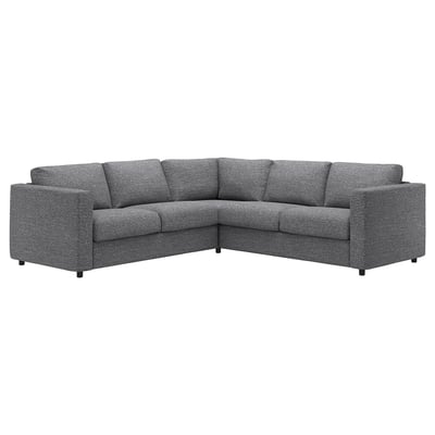 Un divano componibile VIMLE grigio con un design moderno a forma di L in un tessuto morbido e strutturato.