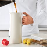BEHÖVD Vacuum flask, beige/red, 1 l