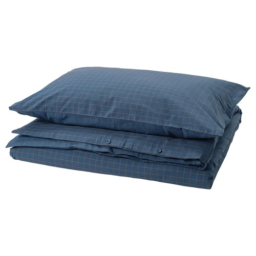 DOFTAKLEJA duvet set in blue, folded neatly, featuring a stitched chequered pattern. Made of cotton.