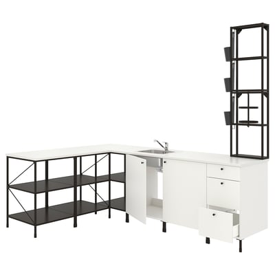 Modern white kitchen unit with black metal framing, featuring open and closed storage, a sink, and a tall shelf.