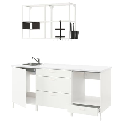 White modular kitchen set featuring base cabinets, countertop, sink, and open shelves in a clean, modern design.