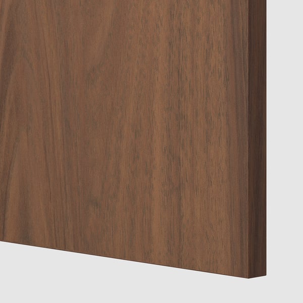 Close-up of dark wooden texture. Smooth, polished surface showcasing fine grain pattern.