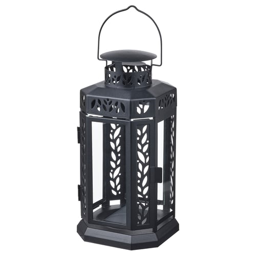 Black ENRUM lantern with leaf designs, suitable indoor/outdoor use, metal & glass, with powder-coated handle & base.