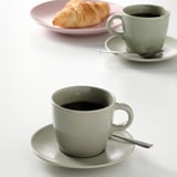 FÄRGKLAR Cup with saucer, matt green, 25 cl