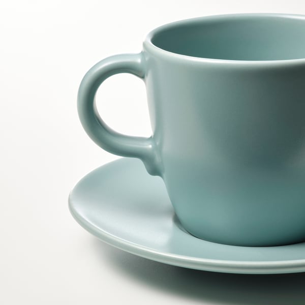 FÄRGKLAR Cup with saucer, matt light turquoise, 25 cl